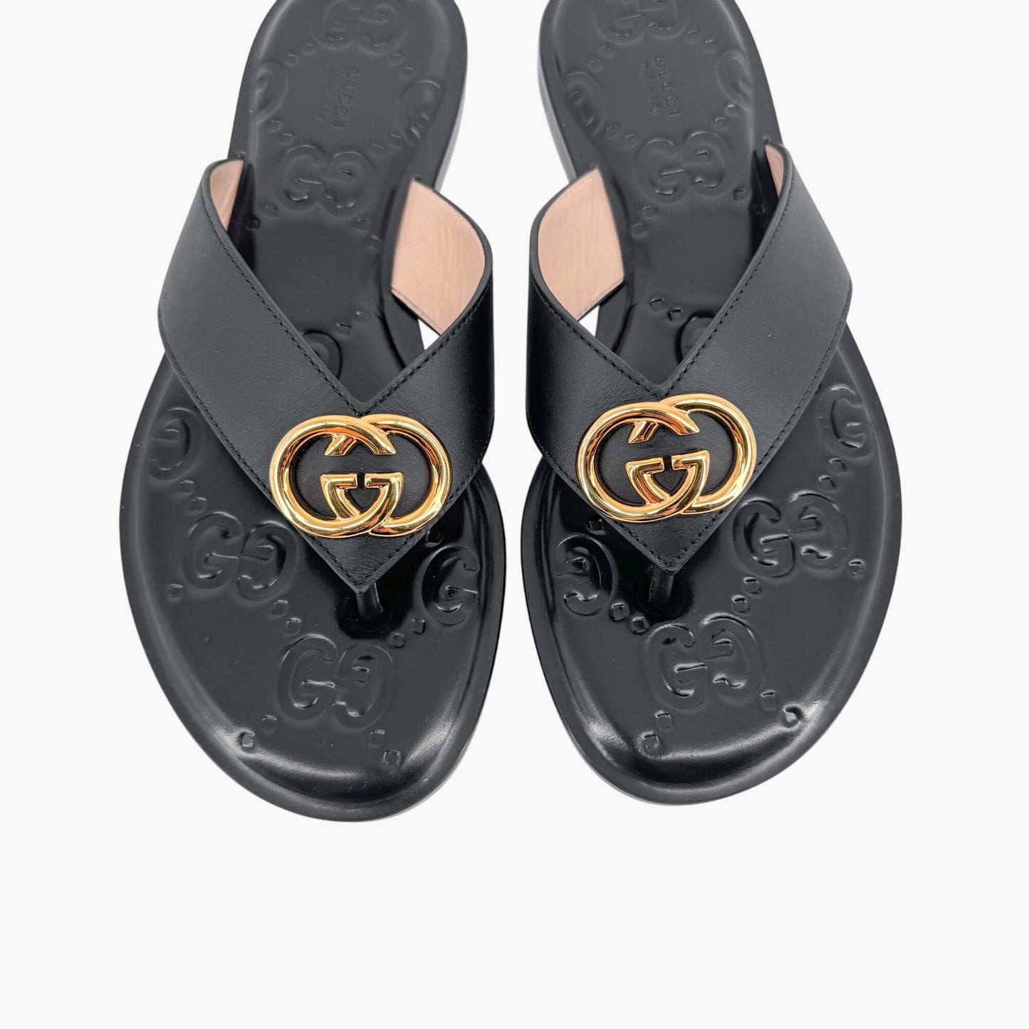 Gucci GG Interlock Embossed Flat Thong Sandals in Black Leather – Size 37