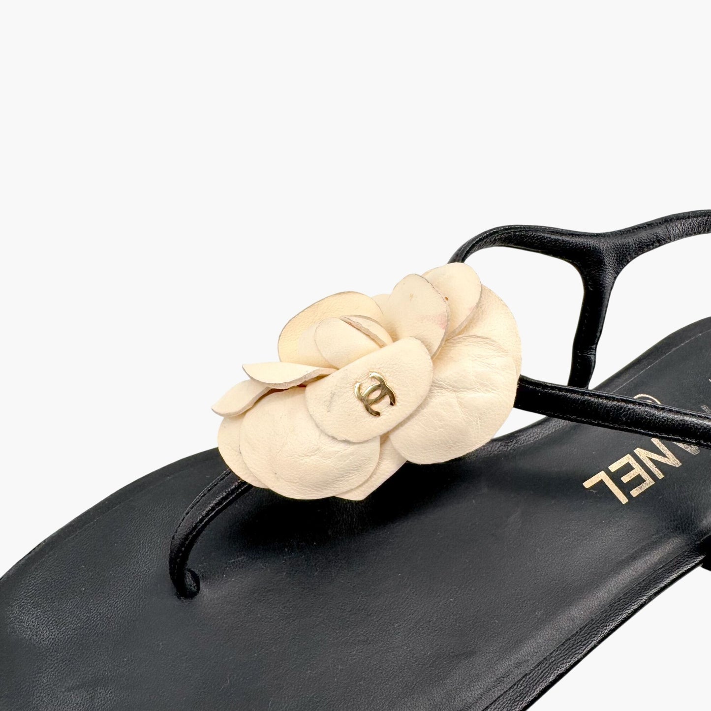 Chanel Camellia CC T-Strap Flat Sandals in Black & Ivory Leather Size 37.5C