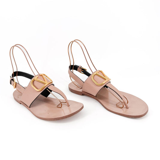 Valentino Garavani Vlogo T-Strap Flat Sandals in Beige Leather – Size 40.5