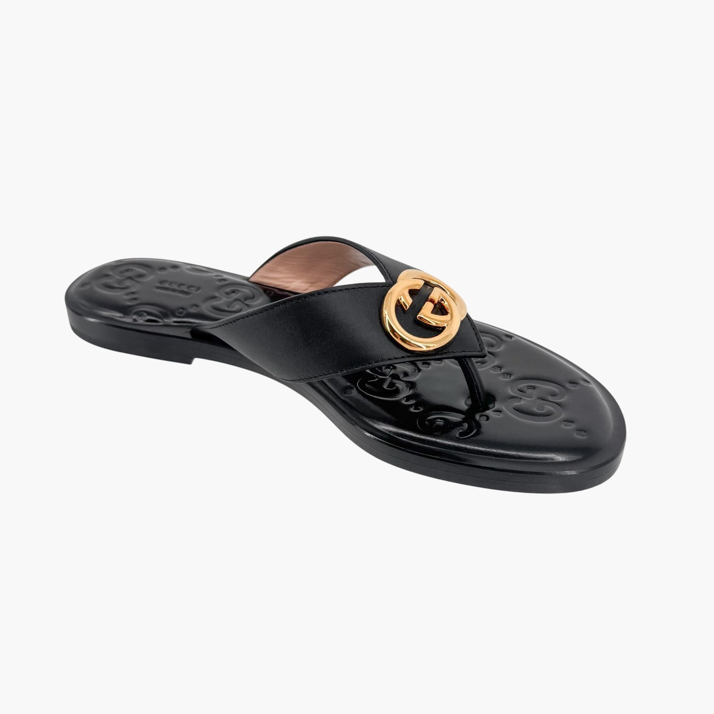 Gucci GG Interlock Embossed Flat Thong Sandals in Black Leather – Size 37