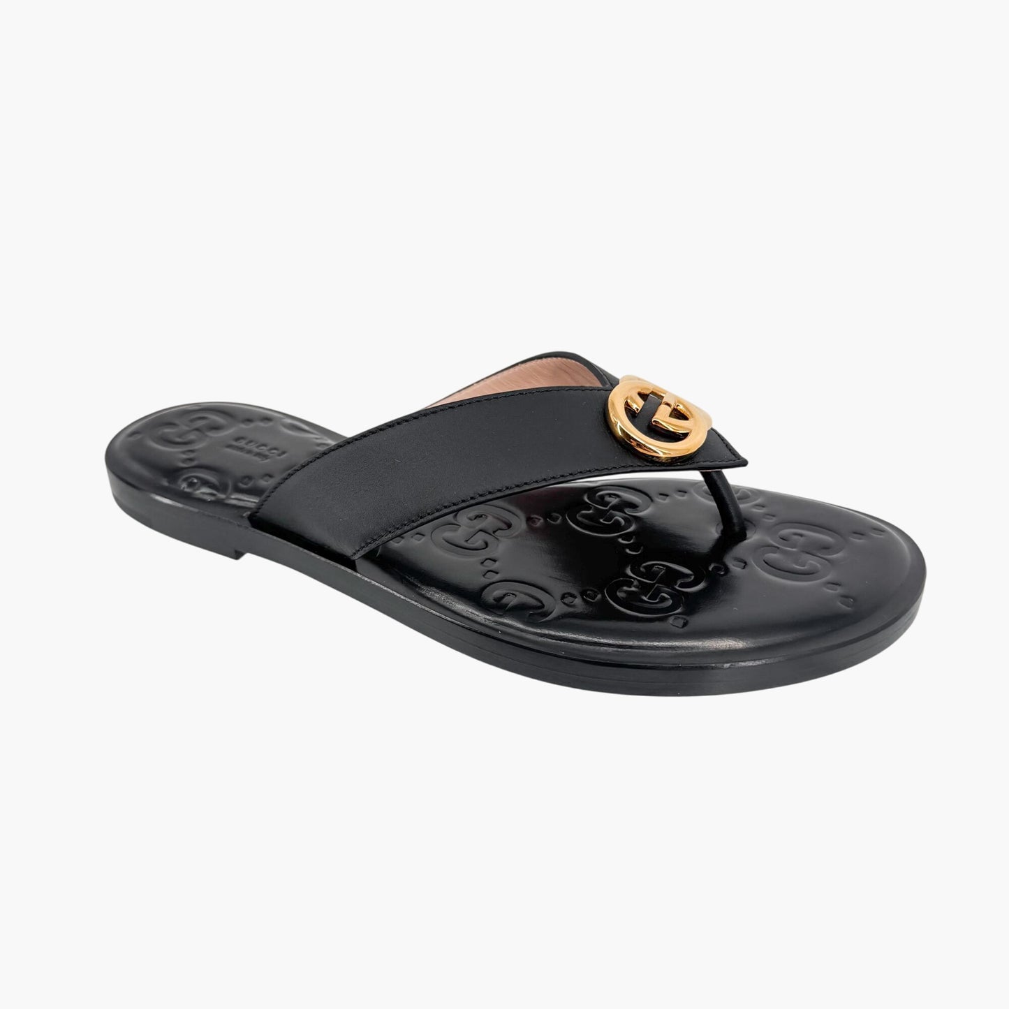 Gucci GG Interlock Embossed Flat Thong Sandals in Black Leather – Size 37