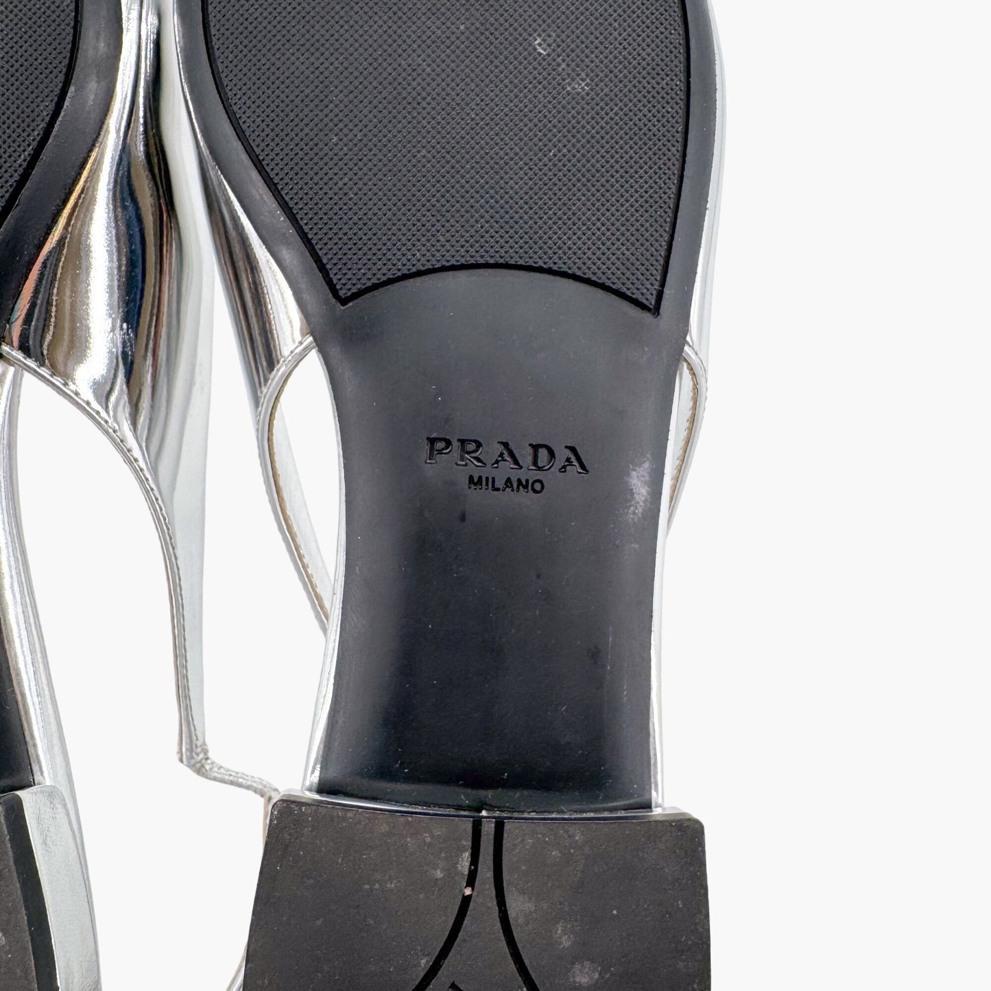 Prada Triangle Logo Slingback Flat in Metallic Silver Leather Size 37