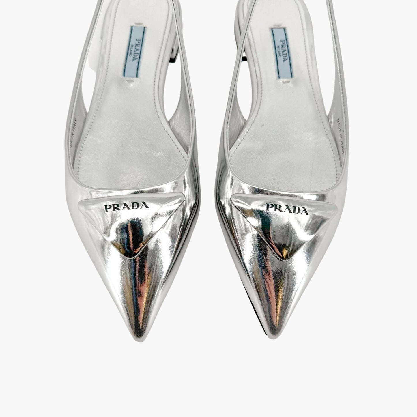 Prada Triangle Logo Slingback Flat in Metallic Silver Leather Size 37