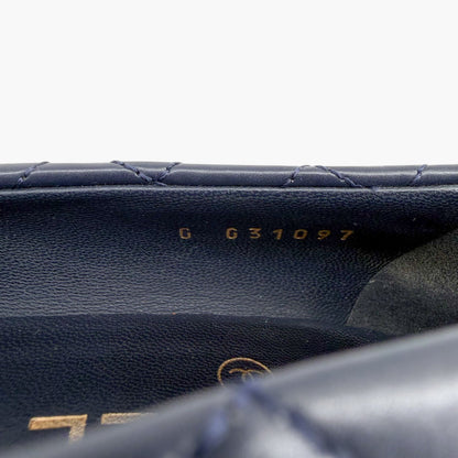 Chanel Camellia Cap Toe Quilted Leather Pumps Blue Size 38.5C