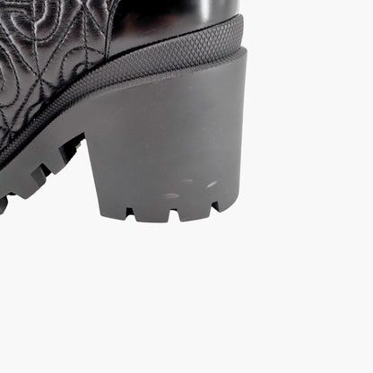 Gucci Trip Zip Front Rhombus Quilted Combat Boots in Black Leather Size 42