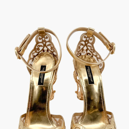 Dolce & Gabbana Fairytale Sculpted Heel Pumps in Metallic Gold Leather Size 38