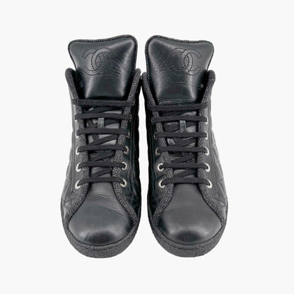 Chanel High Top Quilted CC Sneakers in Black Leather Size 37.5