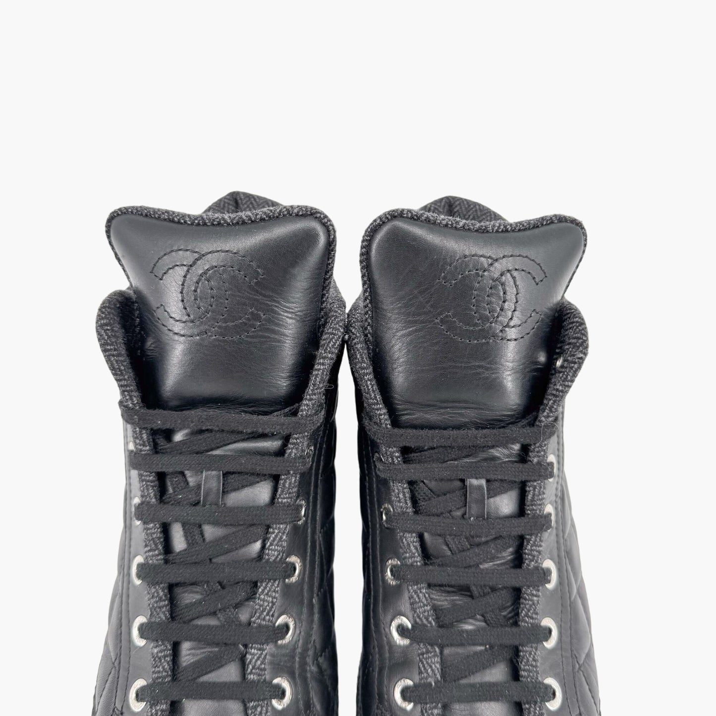 Chanel High Top Quilted CC Sneakers in Black Leather Size 37.5