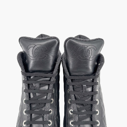 Chanel High Top Quilted CC Sneakers in Black Leather Size 37.5